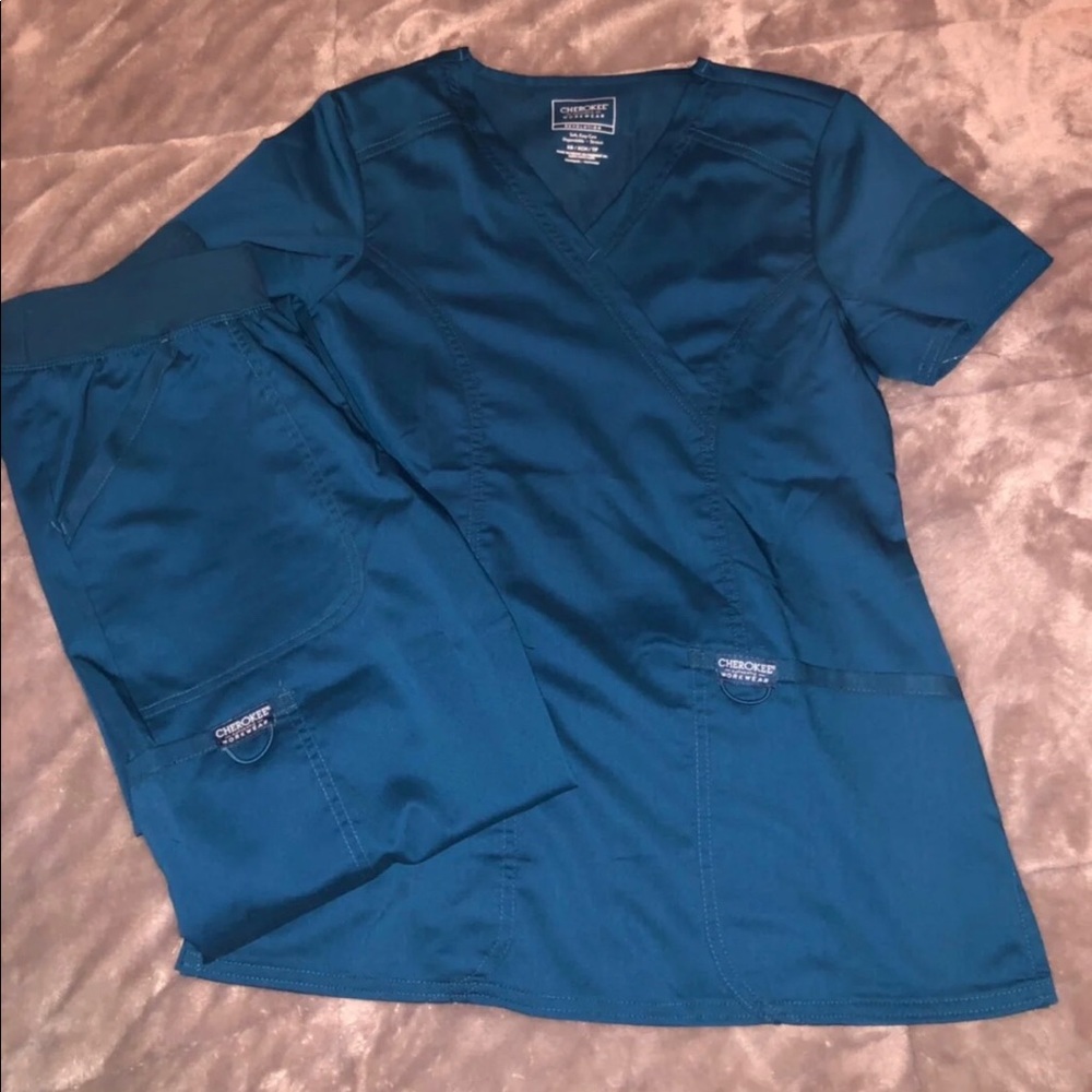 Brand New turquoise Cherokee Stretch scrub set.